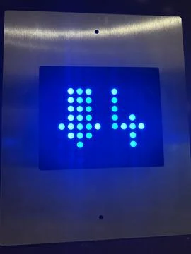 Blue LED Dot Matrix Display with Number 4 and Down Arrow Stock Photos
