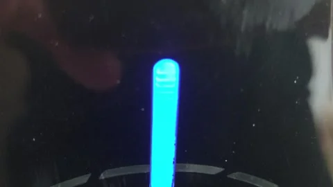 Blue LED indicator light blinking on a electronic device Stock Footage 333641993