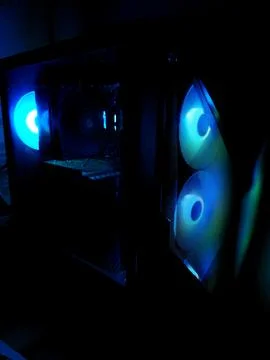 Blue LED Lights on Computer Case with Transparent Side Panel Stock Photos