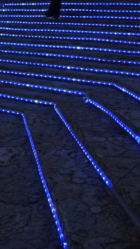 Blue LED Lights Lining Stone Steps at Night Creating Patterned Illuminated .. Stock-Footage 339985433