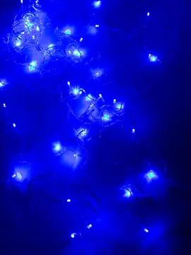 Blue led string lights bokeh wide Stock Photos