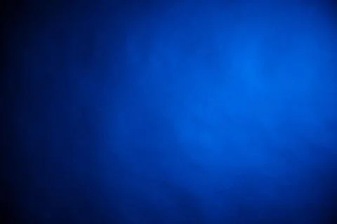 Blue light on black background Stock Photos