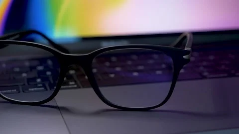 Blue light blocking glasses for filtering blue light from the computer. Stock Footage 150566123