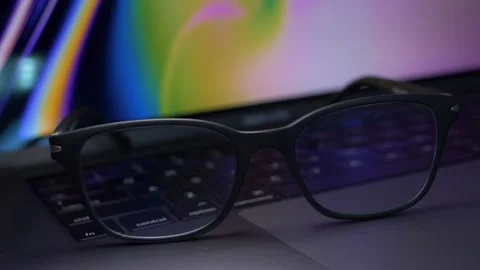 Blue light blocking glasses for filtering blue light from the computer. Stock Footage 150566130