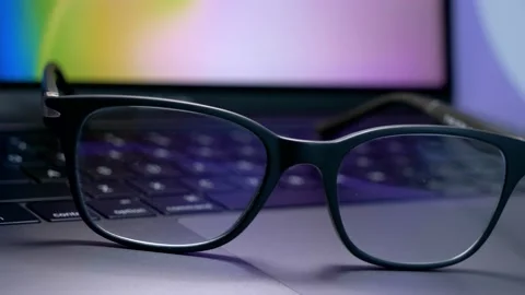 Blue light blocking glasses for filtering blue light from the computer. Stock Footage 150566345
