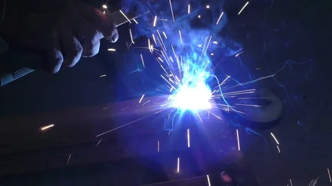 The blue light emerging from welding using arc and electric machine Stock Footage 112854653