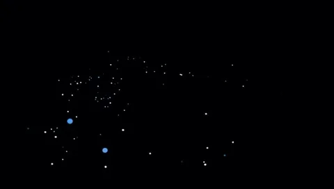 Blue light from Fireflies flying in the black background.  Stockbeeldmateriaal 129895019