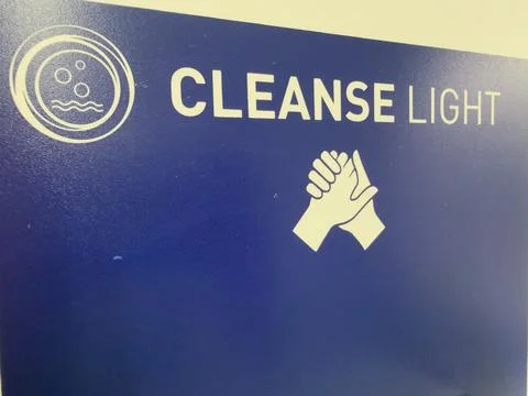 Blue light hand cleansing instruction close up Stock-Fotos