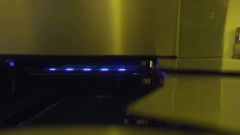 Blue light inside automated machine at electronics factory Vídeos de archivo 348171150