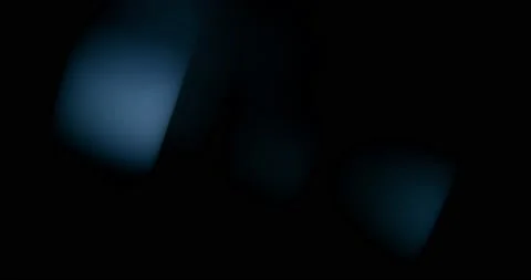 Blue light leaks overlay on black background. Spherical Optical Prism Lens flare Stock Footage 227963806