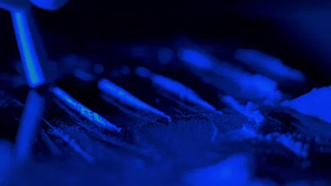 Blue Light of Man Snorting White Powder – Digital Addiction Concept Metaphor 動画素材 318947835