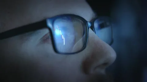 Blue Light Screen Reflection In Eyeglasses Close Up Night Technology Digital Stock Footage 297322437