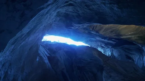 Blue Light Shining Into Stone Cave Rock Wall Stock Footage 168094672