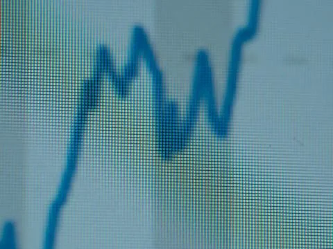 Blue line graph on striped background 스톡 사진