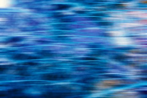 Blue linear background with white flares. Background symbolizing speed Stock Illustration