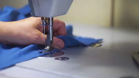 Blue linen fabric sewing process 스톡 동영상 141384979