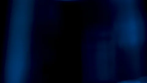Blue lines of light circling and moving Stock Footage 104554178