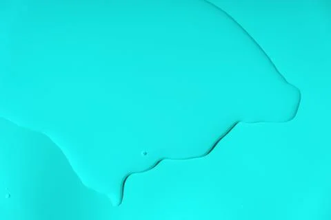 Blue liquid abstract background. Bubbles and textures of water on a blue back Stock Photos