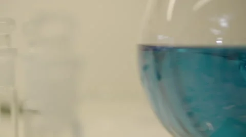 Blue liquid in a bottle Stock Footage 41336476