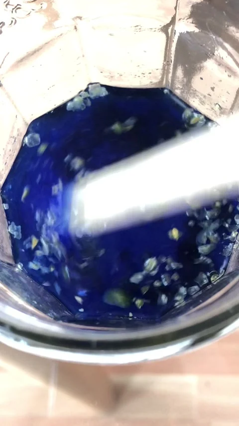 Blue Liquid Floating Spots In Container Abstract Fluid Motion Close-Up Stock-Footage 331079469
