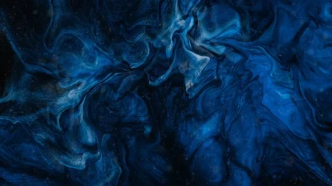 Blue liquid flowing over a black background loop Stock Footage 256486108
