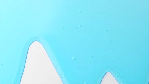 Blue liquid gel flowing, shower fluid gel border, isolated on white background Stock Footage 310522296