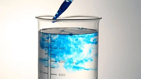 Blue liquid in pipette and beaker Stock Footage 95967662