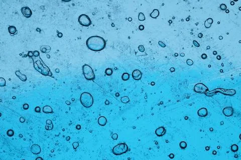 Blue Liquid Surface With Air Bubbles Stock Photos