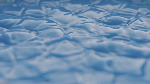 Blue Liquid Vibrate on Sounds Waves in Slow Motion Stock Footage 86421782