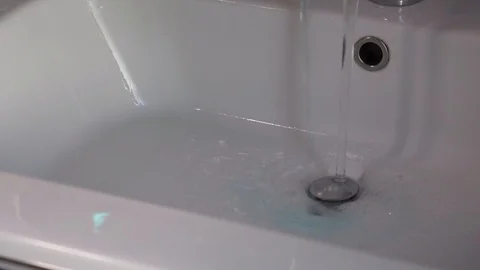 Blue liquid on withe background Stock Footage 124630922