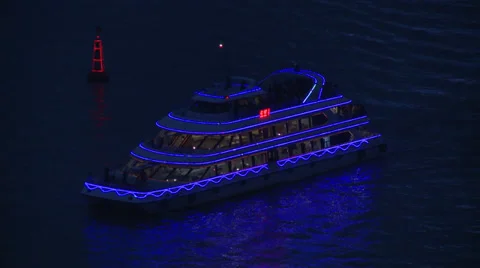 Blue lit boat changing colour Stock Footage 37888979