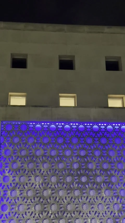 Blue Lit Islamic Pattern on Mosque Exterior at Night Stock Footage 345615488