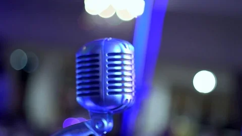 Blue Lit Microphone Stock Footage 76396766