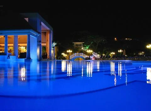 Blue lit pool Stock Photos