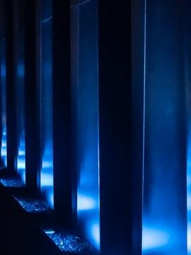 Blue-lit vertical columns Stock Photos