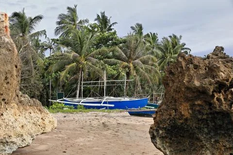 Blue local bangka boats stranded-southern end of Sugar Beach. Sipalay-PH 0475 Stock Photos