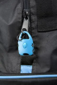 Blue lock on bag Stock Photos