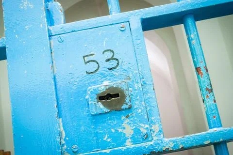 Blue lock in old prison Stock Photos