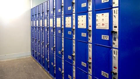 Blue Locker in train station Stock Photos