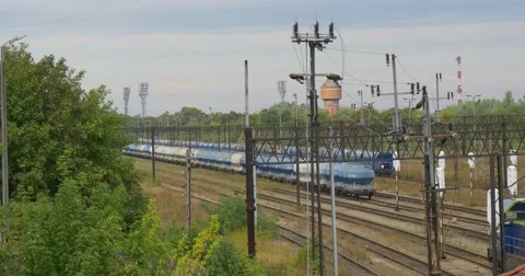 Blue Locomotive Pulls Two Wagons Long Freight Train Stands On The Railroad Stock Footage 54838855