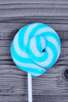Blue lollipop on table Stock Photos