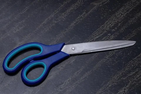 Blue long scissors Stock Photos