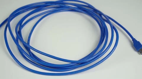 Blue long USB 3.0 cable for connecting camera and computer. USB cable Stock Footage 229615667