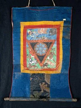 Blue lotus protective triangle. Distemper painting by a Tibetan painter. Stock Illustration