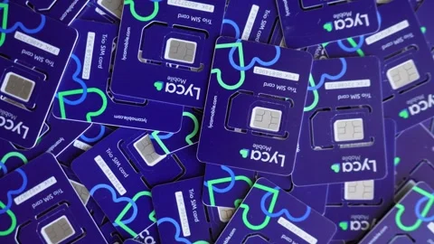 Blue Lyca US SIM Cards are spinning. C0007 Stock Footage 254892249