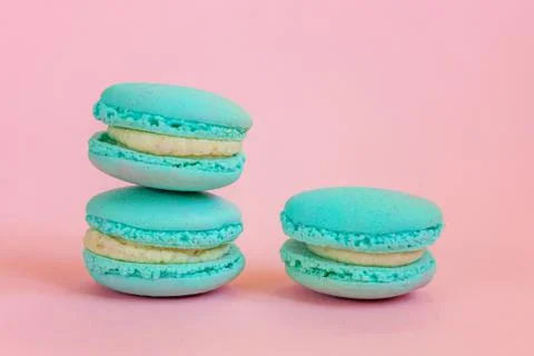 Blue macaron on pink background Stock Photos