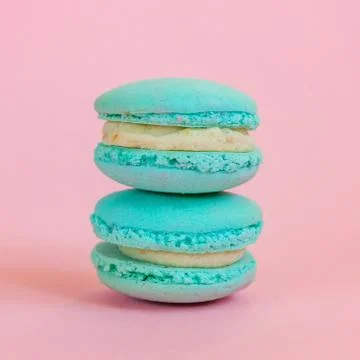 Blue macaron on pink background Stock Photos