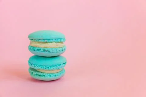 Blue macaron on pink background Stock Photos
