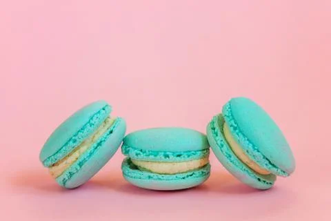 Blue macaron on pink background Stock Photos