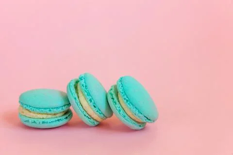 Blue macaron on pink background Stock Photos